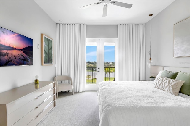 15947 Vetta Dr, Bella Collina, FL 34756 - carpeted bedroom featuring access to exterior, a ceiling fan, and french doors