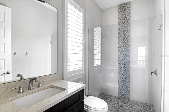 15947 Vetta Dr, Bella Collina, FL 34756 - full bath featuring toilet, a shower stall, and vanity