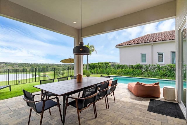 15947 Vetta Dr, Bella Collina, FL 34756 - view of patio with a water view and outdoor dining space