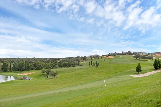 15947 Vetta Dr, Bella Collina, FL 34756 - view of property's community featuring view of golf course, a yard, and a water view