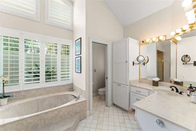 4536 N Landmark Dr, Orlando, FL 32817 - full bath with a garden tub, vanity, tile patterned floors, and high vaulted ceiling