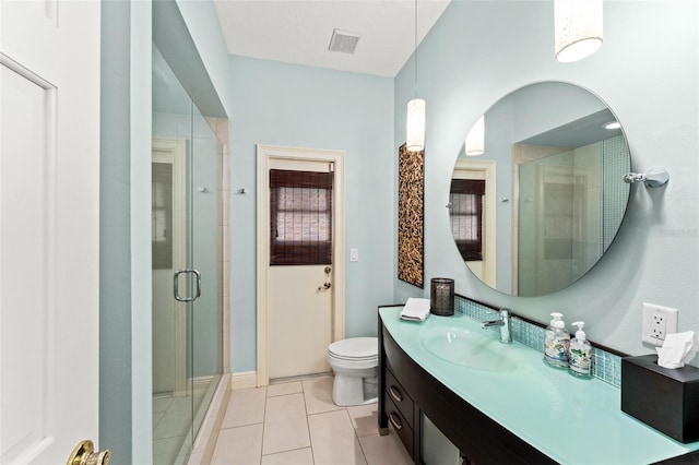 4536 N Landmark Dr, Orlando, FL 32817 - bathroom featuring vanity, tile patterned flooring, and a shower stall