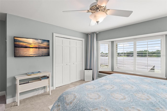 4536 N Landmark Dr, Orlando, FL 32817 - carpeted bedroom featuring a closet and a ceiling fan