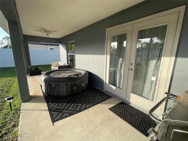 view of patio with ceiling fan and french doors