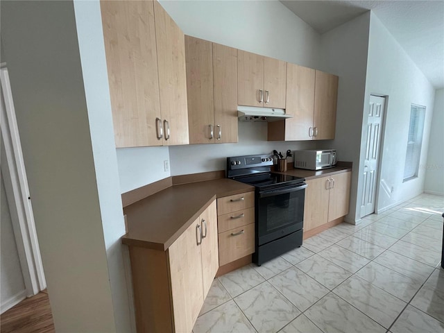 kitchen featuring black range with electric stovetop, light brown cabinetry, under cabinet range hood, and stainless steel microwave