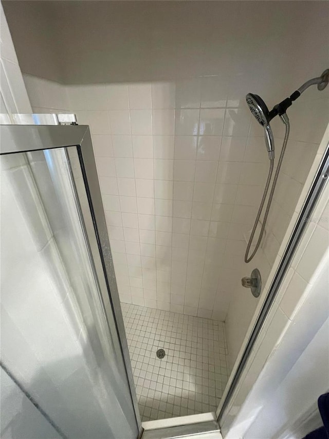 full bathroom with a shower stall