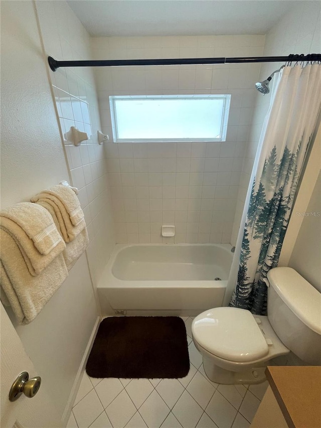 full bathroom featuring toilet, tile patterned flooring, and shower / tub combo