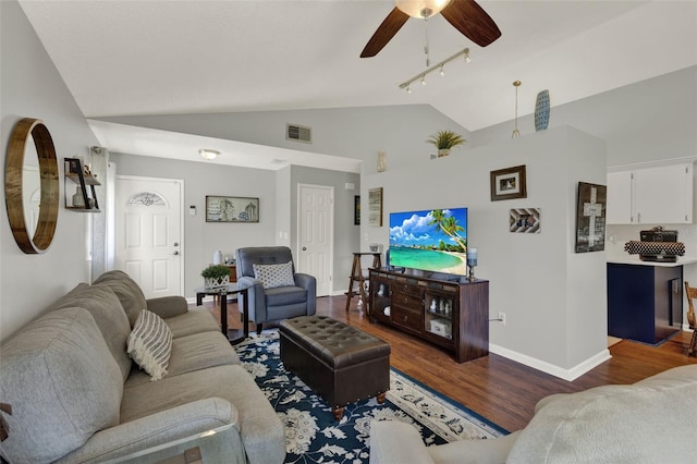 722 Ridgewood Way, Winter Springs, FL 32708 - living area featuring vaulted ceiling, baseboards, rail lighting, ceiling fan, and wood finished floors
