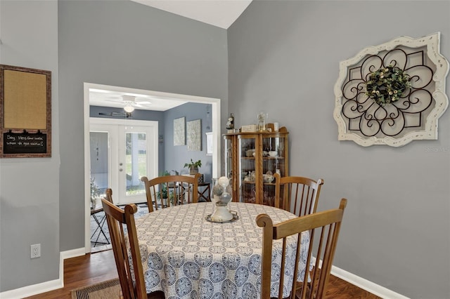 722 Ridgewood Way, Winter Springs, FL 32708 - dining space with baseboards, a ceiling fan, a towering ceiling, and wood finished floors