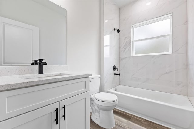 501 Marion Oaks Golf Way, Ocala, FL 34473 - bathroom featuring vanity, toilet, wood finished floors, and shower / bathtub combination