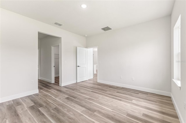 501 Marion Oaks Golf Way, Ocala, FL 34473 - empty room featuring light wood finished floors, baseboards, and recessed lighting