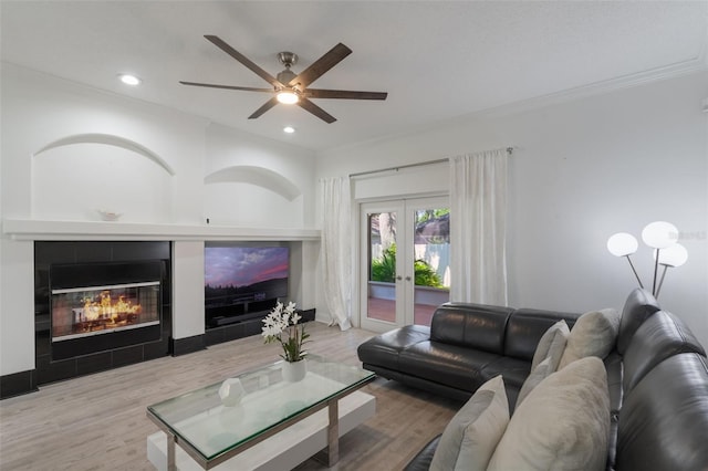 920 Cool Springs Cir, Ocoee, FL 34761 - living area featuring french doors, wood finished floors, ceiling fan, ornamental molding, and recessed lighting