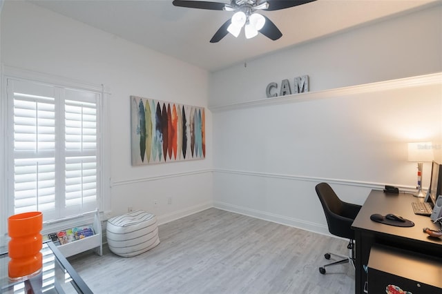 920 Cool Springs Cir, Ocoee, FL 34761 - home office with a ceiling fan, wood finished floors, and baseboards