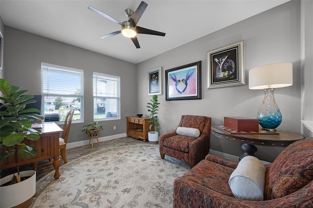15208 Lake Claire Overlook Dr, Winter Garden, FL 34787 - living area with a ceiling fan, baseboards, and a desk
