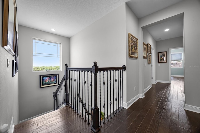 15208 Lake Claire Overlook Dr, Winter Garden, FL 34787 - corridor with an upstairs landing, wood finished floors, baseboards, and recessed lighting