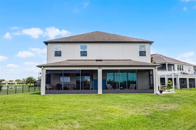 15208 Lake Claire Overlook Dr, Winter Garden, FL 34787 - back of house with a sunroom, stucco siding, and roof with shingles