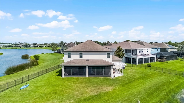 15208 Lake Claire Overlook Dr, Winter Garden, FL 34787 - back of property with a sunroom, a water view, and roof with shingles