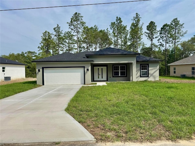 152 W Diego Pl, Citrus Springs, FL 34434 - view of front facade featuring an attached garage, stucco siding, concrete driveway, and a front lawn