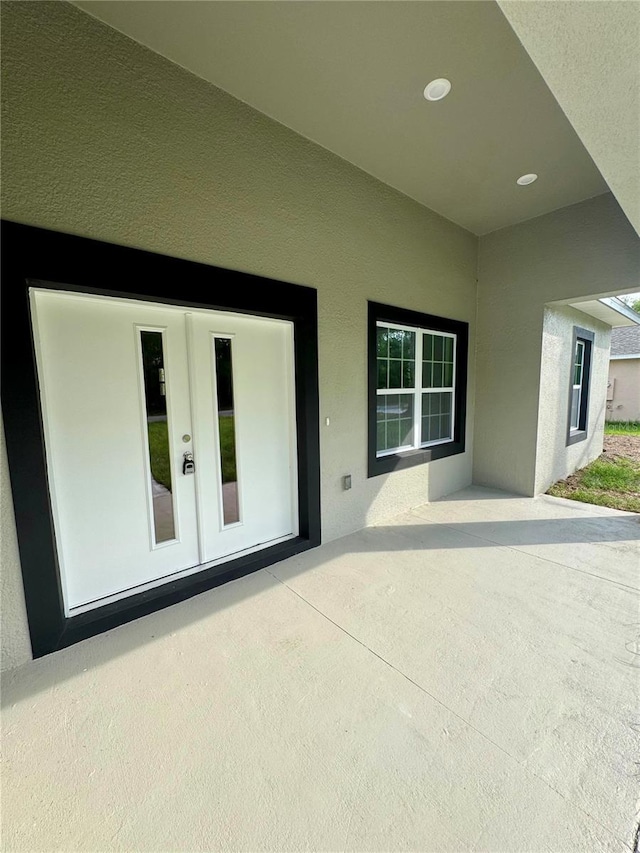 152 W Diego Pl, Citrus Springs, FL 34434 - view of patio / terrace featuring french doors