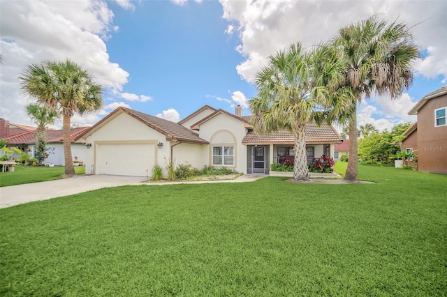 view of front facade with a front lawn, stucco siding, a tiled roof, an attached garage, and concrete driveway