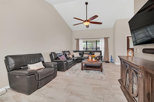 living room with a ceiling fan, high vaulted ceiling, and light marble finish floors