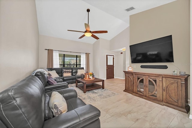 living room featuring ceiling fan, high vaulted ceiling, light marble finish flooring, and baseboards