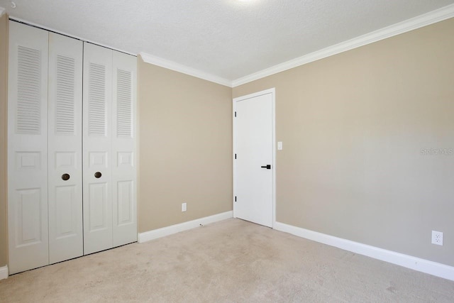 2320 Wekiva Ridge Rd, Apopka, FL 32712 - unfurnished bedroom featuring baseboards, light colored carpet, ornamental molding, and a closet
