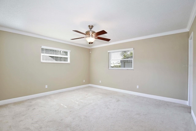 2320 Wekiva Ridge Rd, Apopka, FL 32712 - spare room featuring crown molding, baseboards, ceiling fan, and light colored carpet