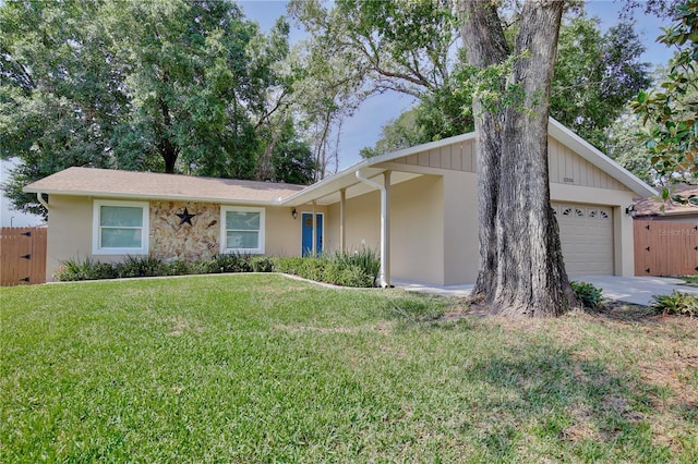 2320 Wekiva Ridge Rd, Apopka, FL 32712 - view of front of house with a garage and stucco siding