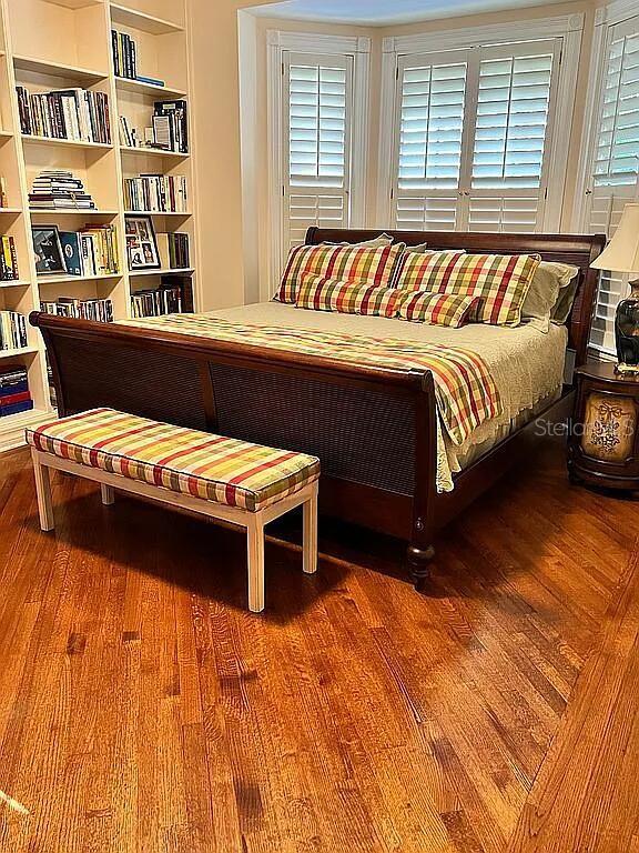 11317 NW 199th Ave, Alachua, FL 32615 - bedroom with wood finished floors
