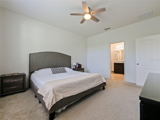 4553 Baler Trails Dr, Saint Cloud, FL 34772 - bedroom featuring light colored carpet, a ceiling fan, and connected bathroom