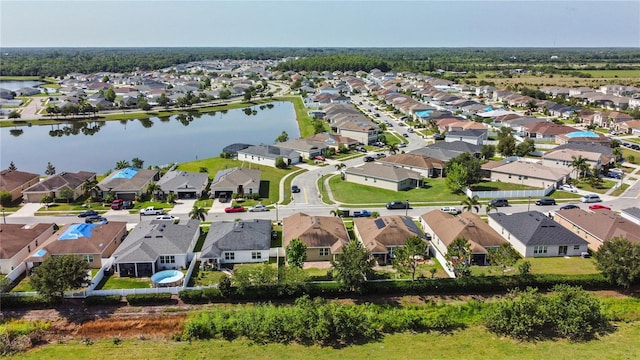 4553 Baler Trails Dr, Saint Cloud, FL 34772 - aerial perspective of suburban area with a nearby body of water