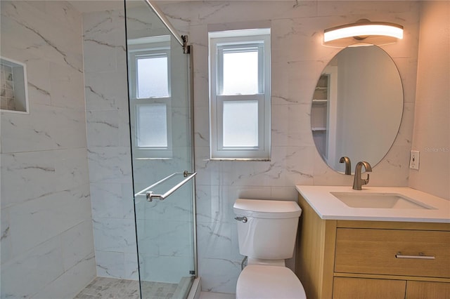 1933 Oregon Trl, Englewood, FL 34224 - full bathroom with a shower stall, vanity, toilet, and tile walls
