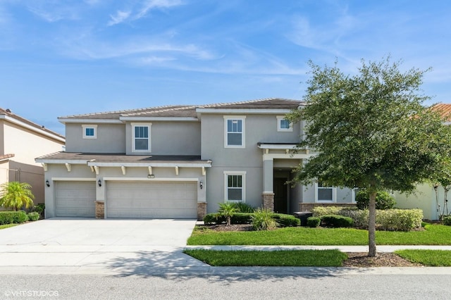 7017 Oakwood St, Davenport, FL 33837 - view of front facade featuring stucco siding, a garage, driveway, and stone siding
