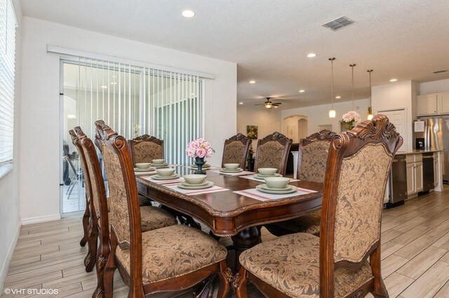 7017 Oakwood St, Davenport, FL 33837 - dining area with light wood-style flooring, recessed lighting, ceiling fan, and baseboards