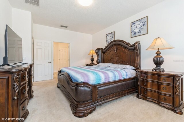 7017 Oakwood St, Davenport, FL 33837 - bedroom featuring light colored carpet