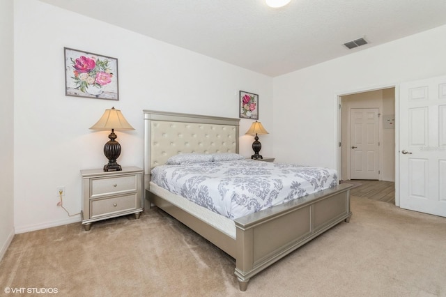 7017 Oakwood St, Davenport, FL 33837 - bedroom featuring light carpet and baseboards