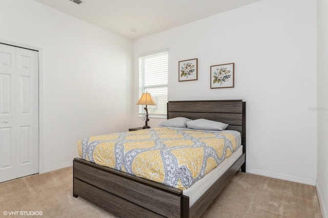 7017 Oakwood St, Davenport, FL 33837 - carpeted bedroom with baseboards