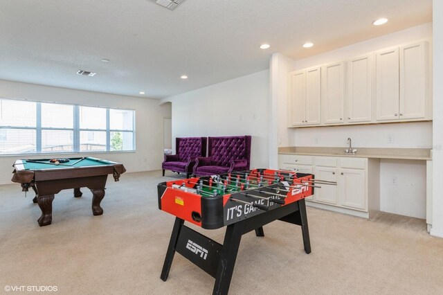 7017 Oakwood St, Davenport, FL 33837 - recreation room with light carpet, recessed lighting, a sink, and billiards table
