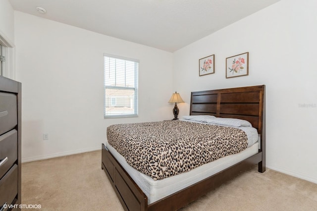 7017 Oakwood St, Davenport, FL 33837 - bedroom with light carpet and baseboards