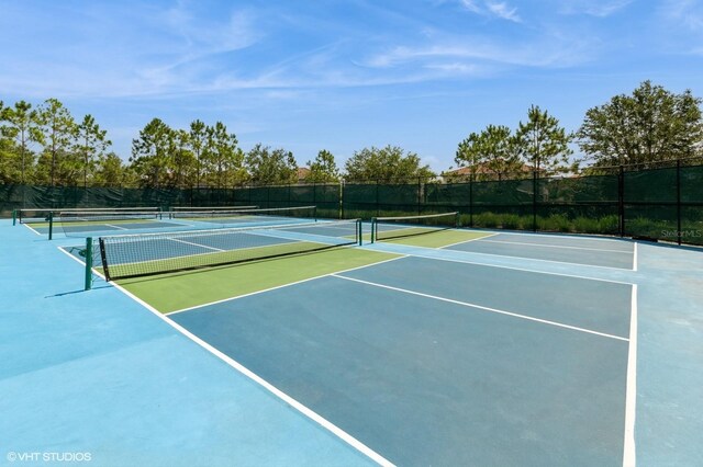 7017 Oakwood St, Davenport, FL 33837 - view of tennis court with community basketball court