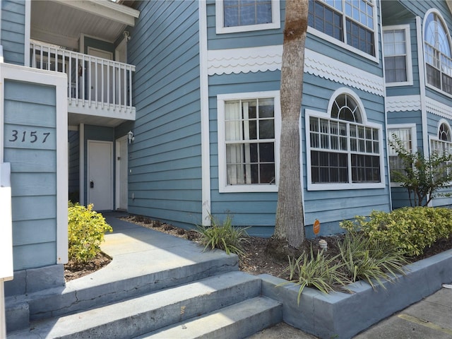 3157 Britannia Blvd Unit B, Kissimmee, FL 34747 - doorway to property with a balcony