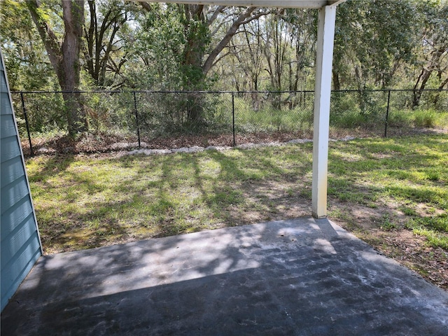 3157 Britannia Blvd Unit B, Kissimmee, FL 34747 - view of yard featuring a patio area