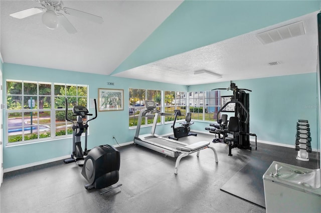 2020 Royal Bay Blvd Unit 91, Kissimmee, FL 34746 - workout area featuring ceiling fan, a textured ceiling, and baseboards