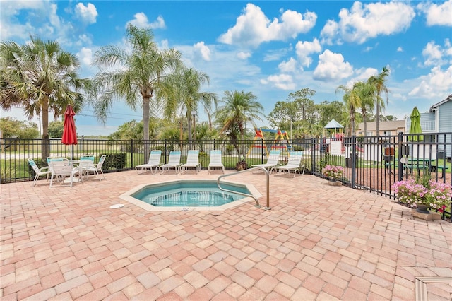 2020 Royal Bay Blvd Unit 91, Kissimmee, FL 34746 - view of swimming pool featuring a hot tub and a patio area