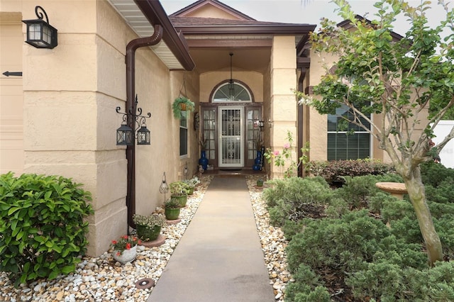 2021 Wildfire Ct, Apopka, FL 32703 - view of exterior entry featuring stucco siding