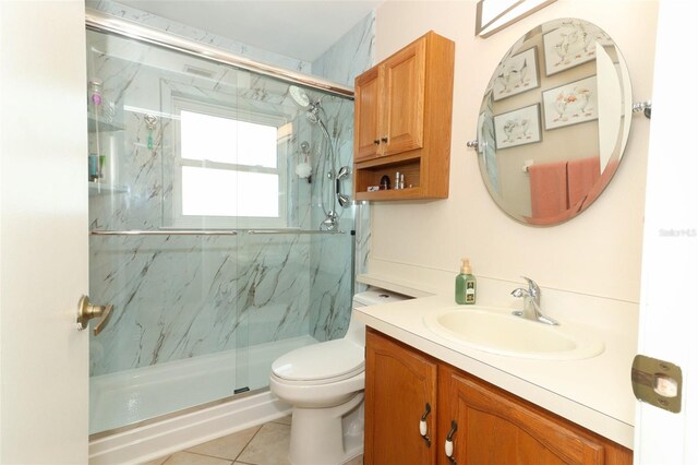 2021 Wildfire Ct, Apopka, FL 32703 - bathroom with vanity, a marble finish shower, toilet, and tile patterned flooring