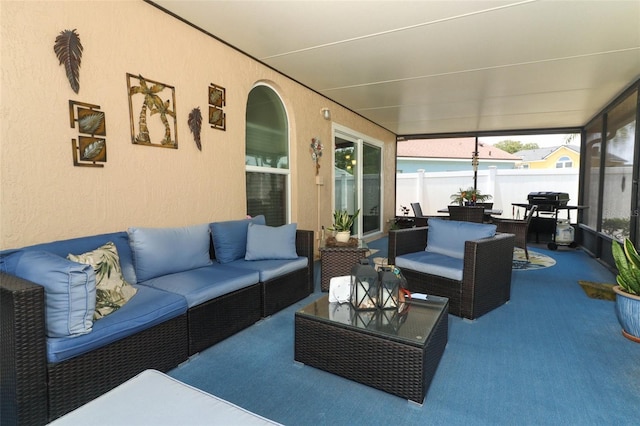 2021 Wildfire Ct, Apopka, FL 32703 - sunroom with an outdoor living space and carpet floors