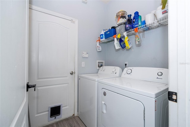 17614 Woodcrest Way, Clermont, FL 34714 - washroom featuring washing machine and clothes dryer and light wood-style floors