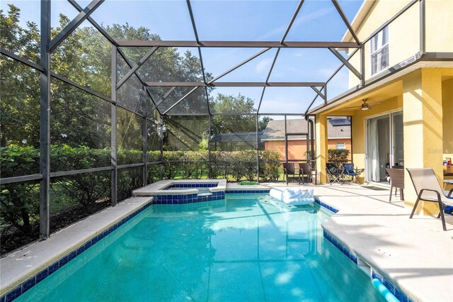 17614 Woodcrest Way, Clermont, FL 34714 - view of pool featuring a patio, a pool with connected hot tub, and a lanai